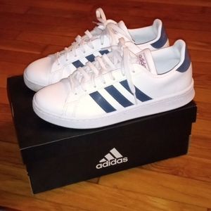 Like new Woman's Adidas Grand Court Tennis Shoes. Size 9 1/2. Dark Blue Stripes.